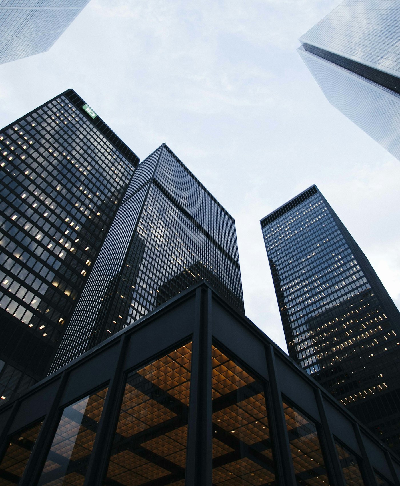 Glass office towers seen from street level